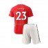 Maglie da Calcio Manchester United Luke Shaw 23 Bambino Prima Tenuta 2022-2023 Maniche Corte